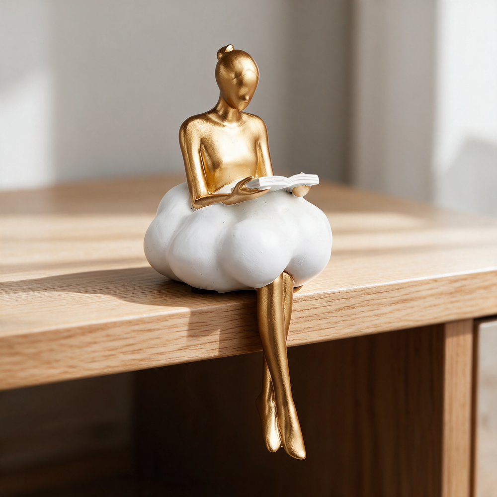 Nordic Girl Keepsake Statuette - Read A Book on wood surface