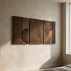 Geometric wood wall art on plaster accent wall