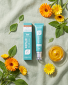 Ceramide Scar Repair Cream botanical flat lay with calendula flowers
